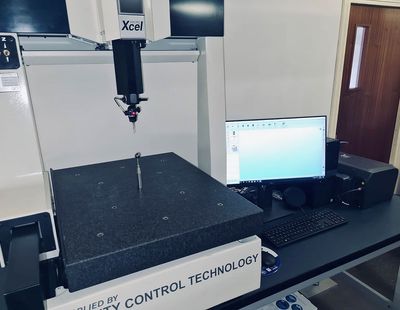 Inspection of finished CNC components at Clarent Precision